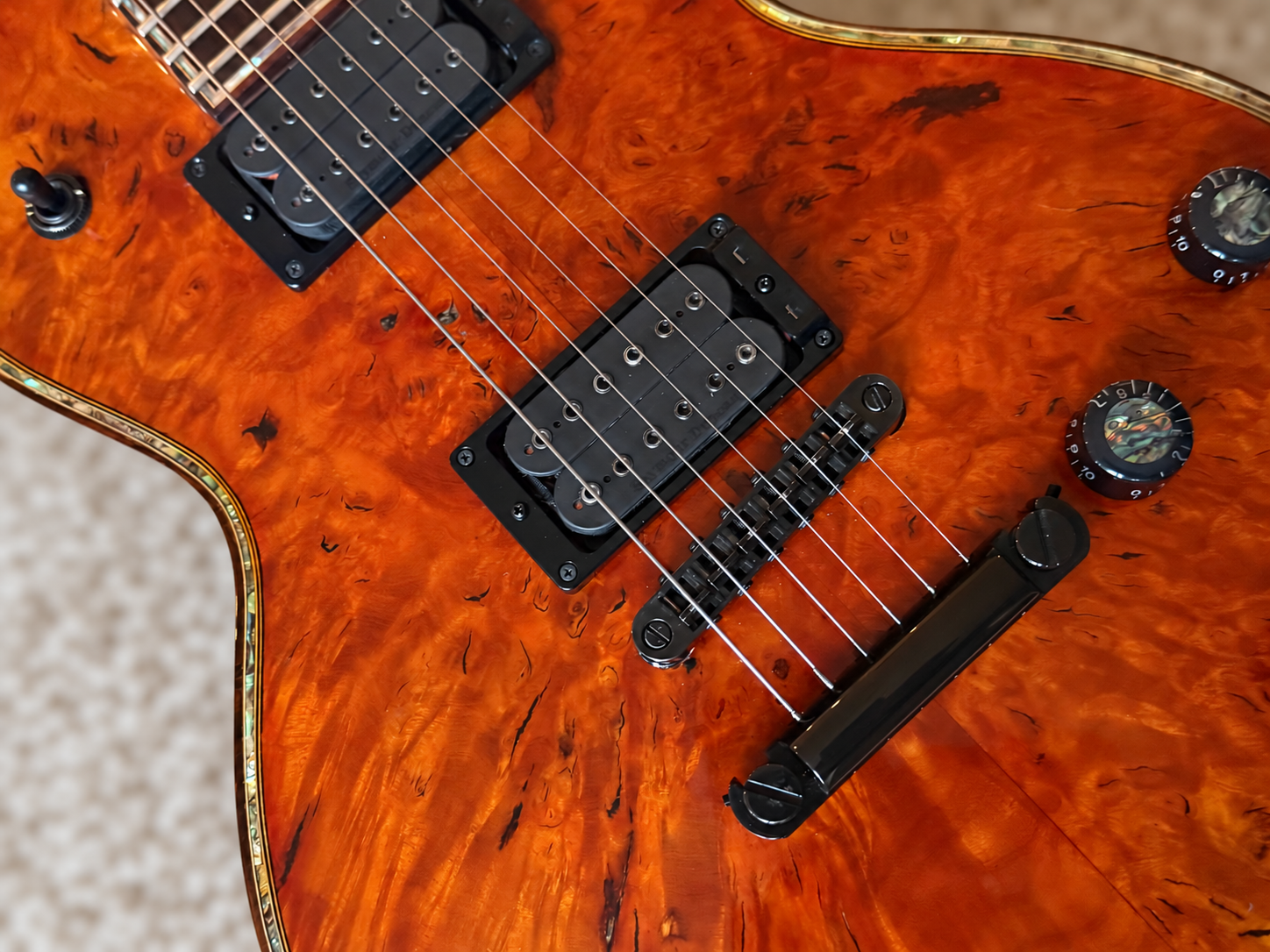 Panda guitar burled top, Seymour Duncan pickups, and custom switching controls